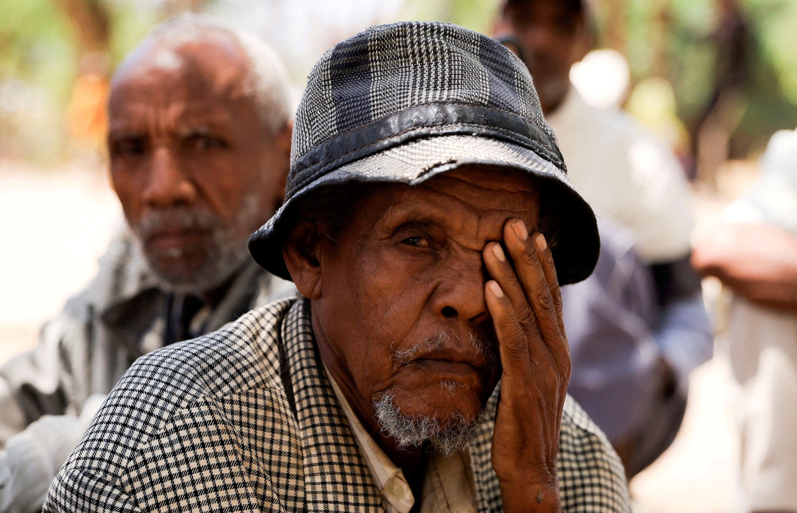 FILE PHOTO: People displaced due to the fighting between the Tigray People's Liberation Front (TPLF) forces and Ethiopian National Defence Force (ENDF) allied with Amhara Special Forces, rest outside their shelter at the Abi Adi camp for the Internally Displaced Persons in Abi Adi, Tigray Region, Ethiopia, June 24, 2023. REUTERS/Tiksa Negeri/File Photo